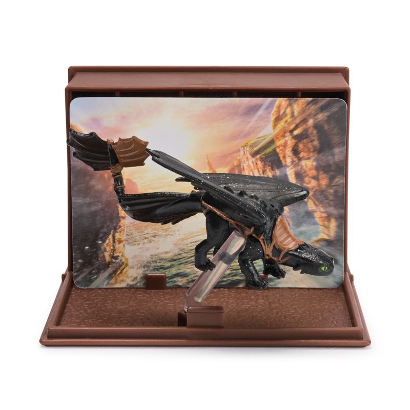 Drachenzähmen leicht gemacht Figur mit Karten im Drachenbuch