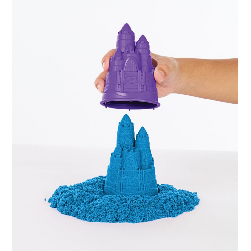 Kinetic Sand Box mit flüssigem Sand und blauer Unterlage